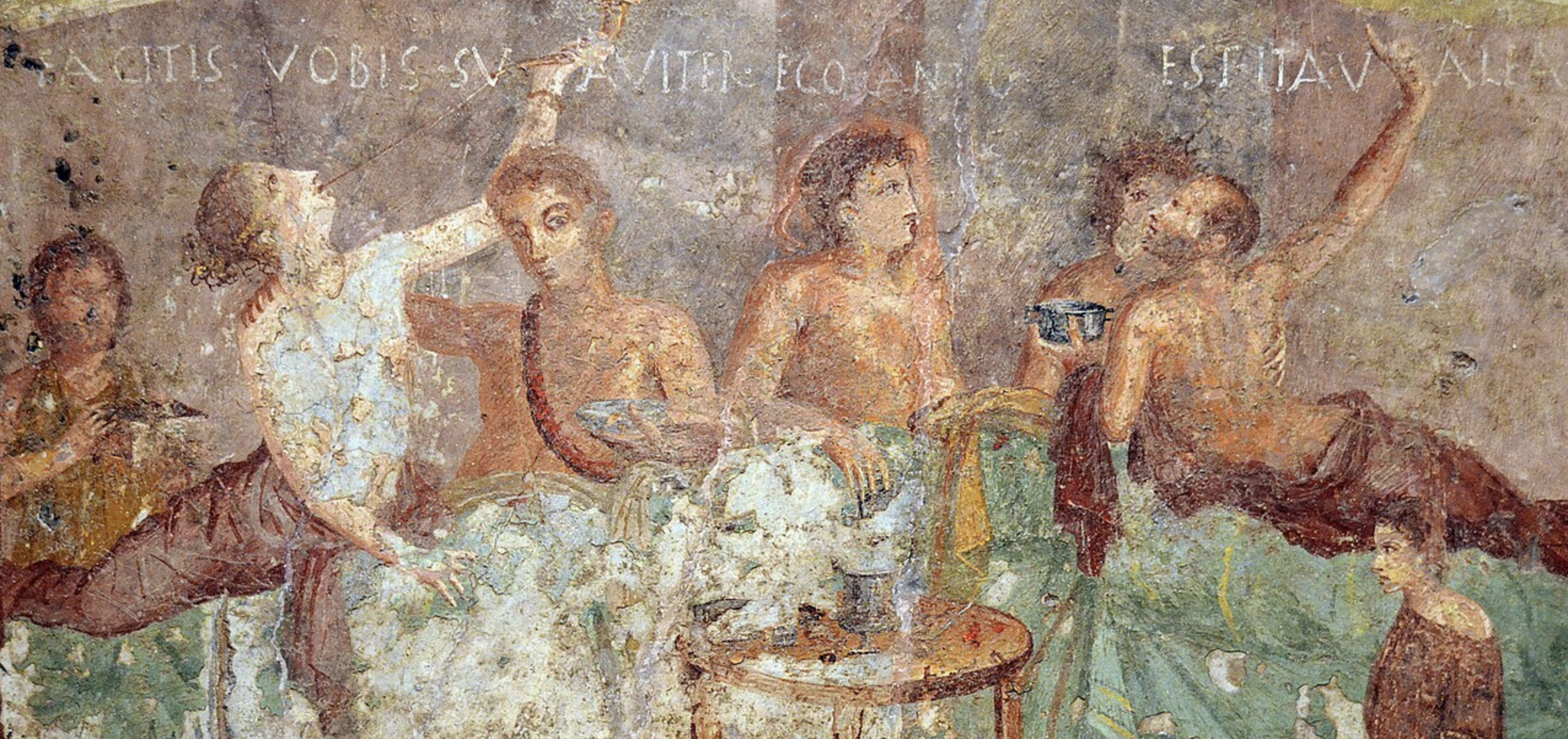 a roman fresco depicting men feasting at a banquet